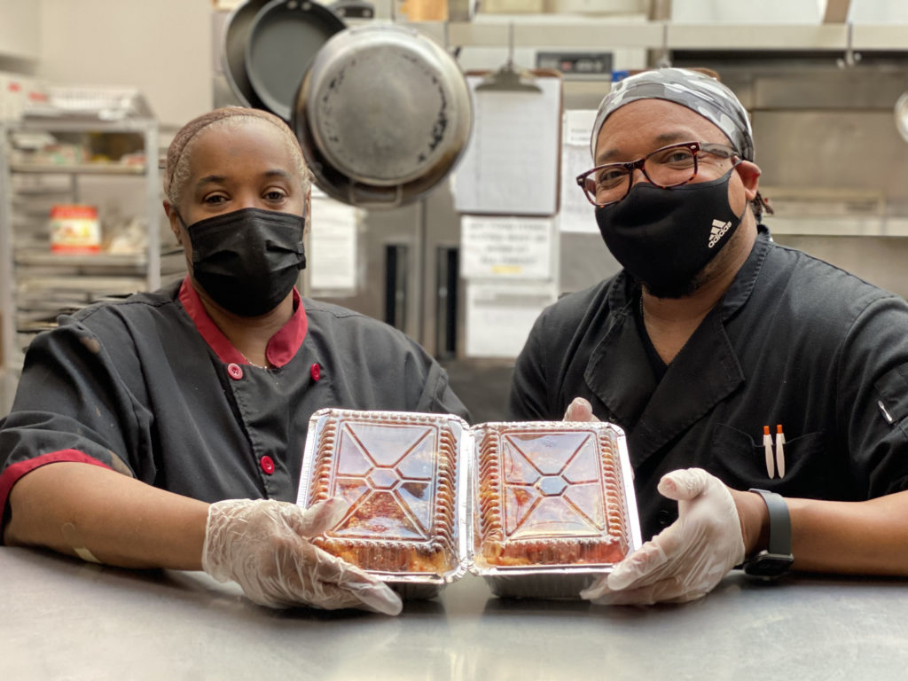 chefs holding food